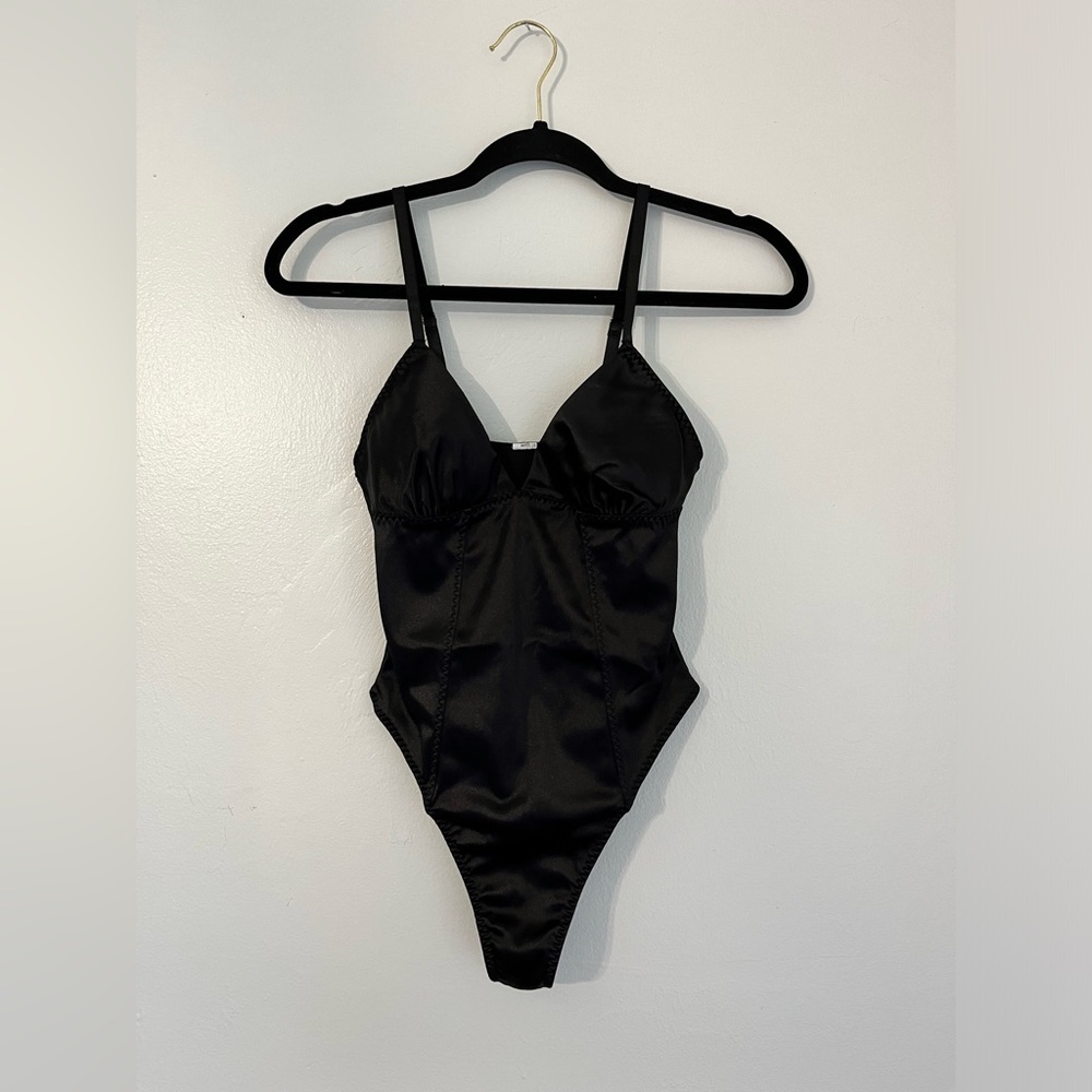 Women's black bodysuit, extra small size, Forever 21 brand.